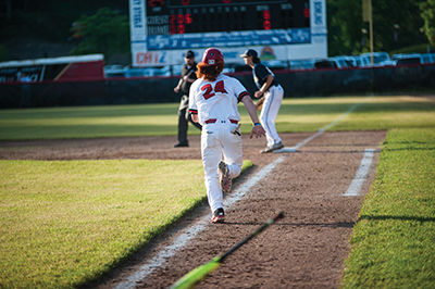 Ronnie Long III takes off down the first base line